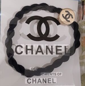 Chanel Hair Accessory. A beautiful twisted band with black on gold CC